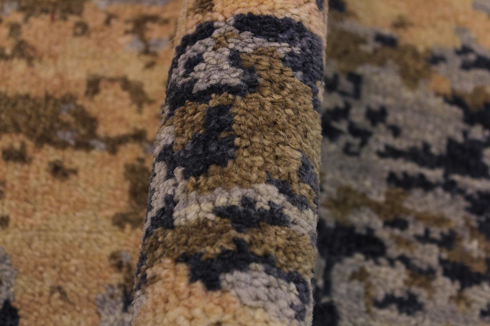 A11874 711"x 8 1"Modern                        8x8TaupeGREYHand-knotted                  Pakistan   100% Wool  Round      652671216077